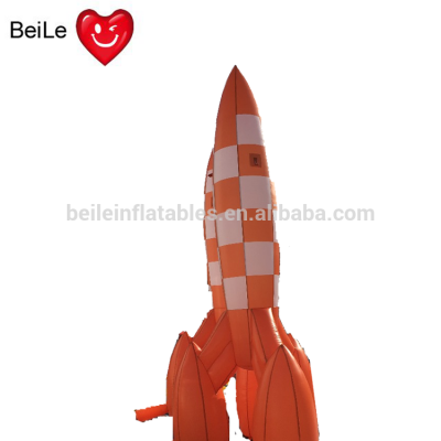 Inflatable rocket shaped balloon